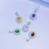 Colored gemstone necklace in 925 silver with multiple pendants, luxury fine jewelry close-up