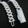 Hand-setting VVS moissanite stones on Cuban chain