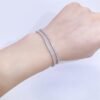 Unisex 2 mm VVS moissanite tennis bracelet on wrist