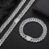 Silver 10mm Miami Cuban chain necklace and bracelet set displayed on table