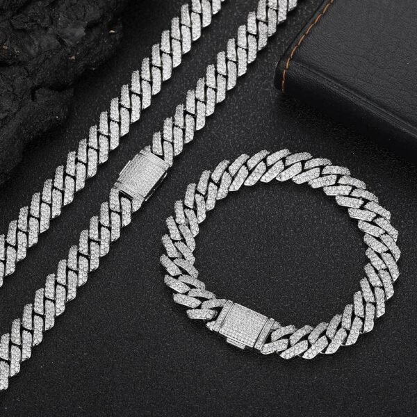 Silver 10mm Miami Cuban chain necklace and bracelet set displayed on table