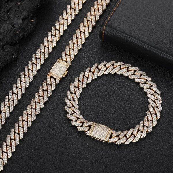 Gold 10mm Miami Cuban chain necklace and bracelet set displayed on table