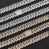 Six iced out 10mm Miami Cuban chains in silver and gold laid on black background