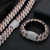 Two-tone rose gold and silver bold Cuban chain set on table, necklace laid flat, bracelet closed and standing