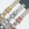 Close-up of 6.5mm moissanite tennis chains in white gold, yellow gold, and rose gold showing clasp and fire of stones