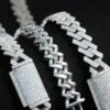 Close-up of custom clasps and backside details on 10mm moissanite Cuban chains in three colors