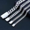 Backside view of four 925 silver Cuban chains in different widths showing stamped hallmark
