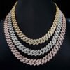 Three-tone display of 10mm VVS moissanite Cuban chains in white gold, yellow gold, and rose gold on mannequin