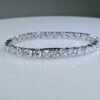 VVS Tennis bracelet shown on a table with Clasp closed