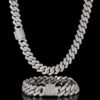 One silver 14mm Cuban chain hanging on top, with matching bracelet below on black background
