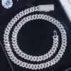 8mm silver Flat Cuban chain with VVS moissanite laid flat on white background showing craftsmanship