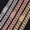 brass 15mm cuban link chain laid flat on black background showing polished links