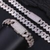 close-up detail of 4-row CZ stones on brass cuban chain showing sparkle under light