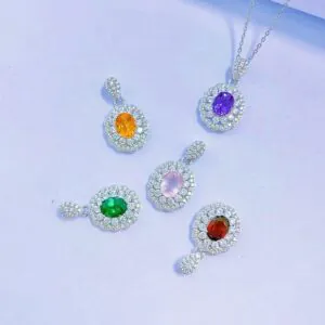 Colored gemstone necklace in 925 silver with multiple pendants, luxury fine jewelry close-up