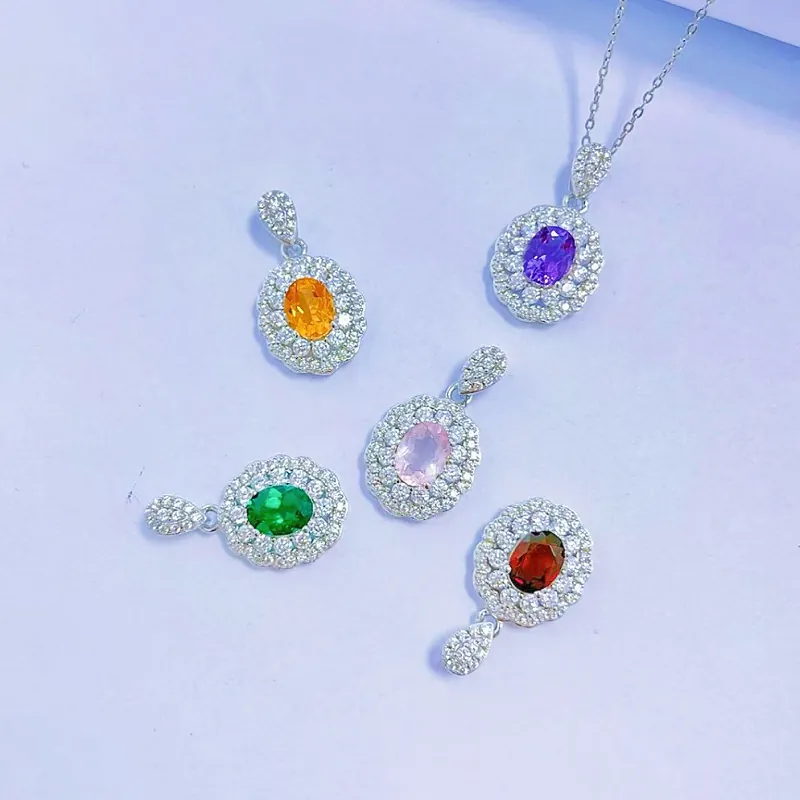 Colored gemstone necklace in 925 silver with multiple pendants, luxury fine jewelry close-up