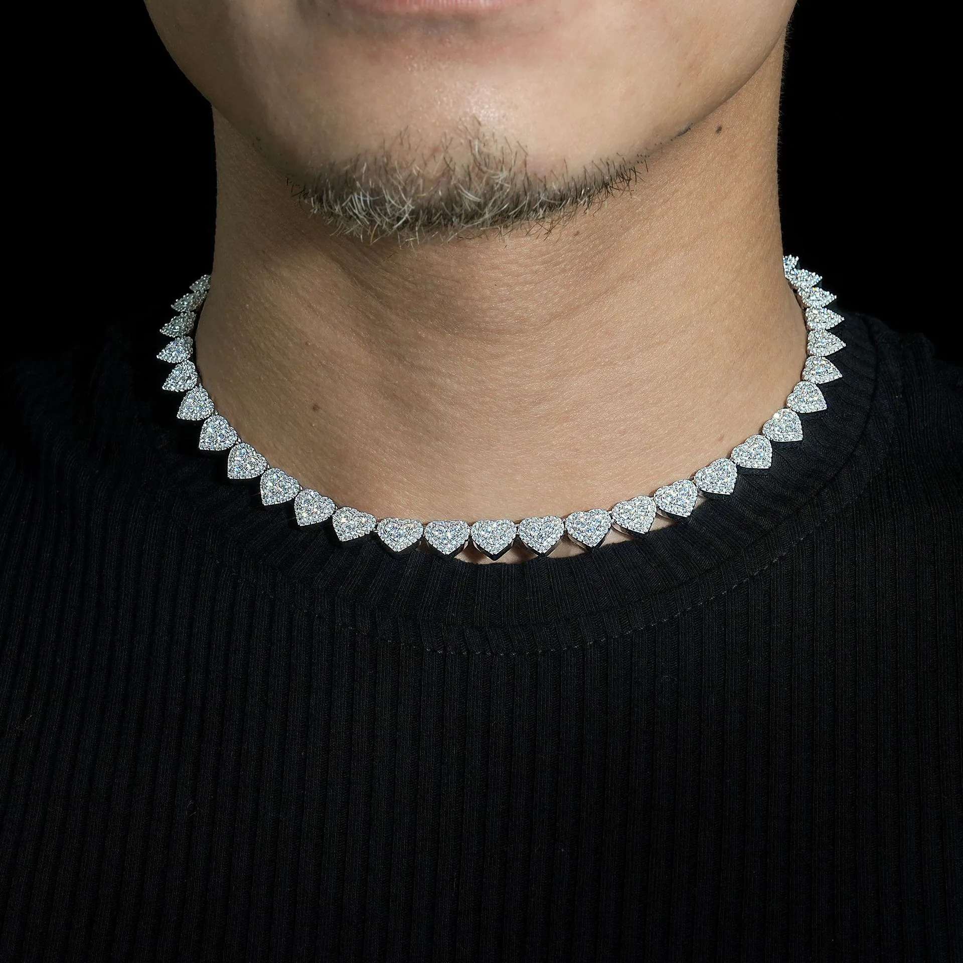 Man wearing heart-shaped moissanite chain in 925 silver