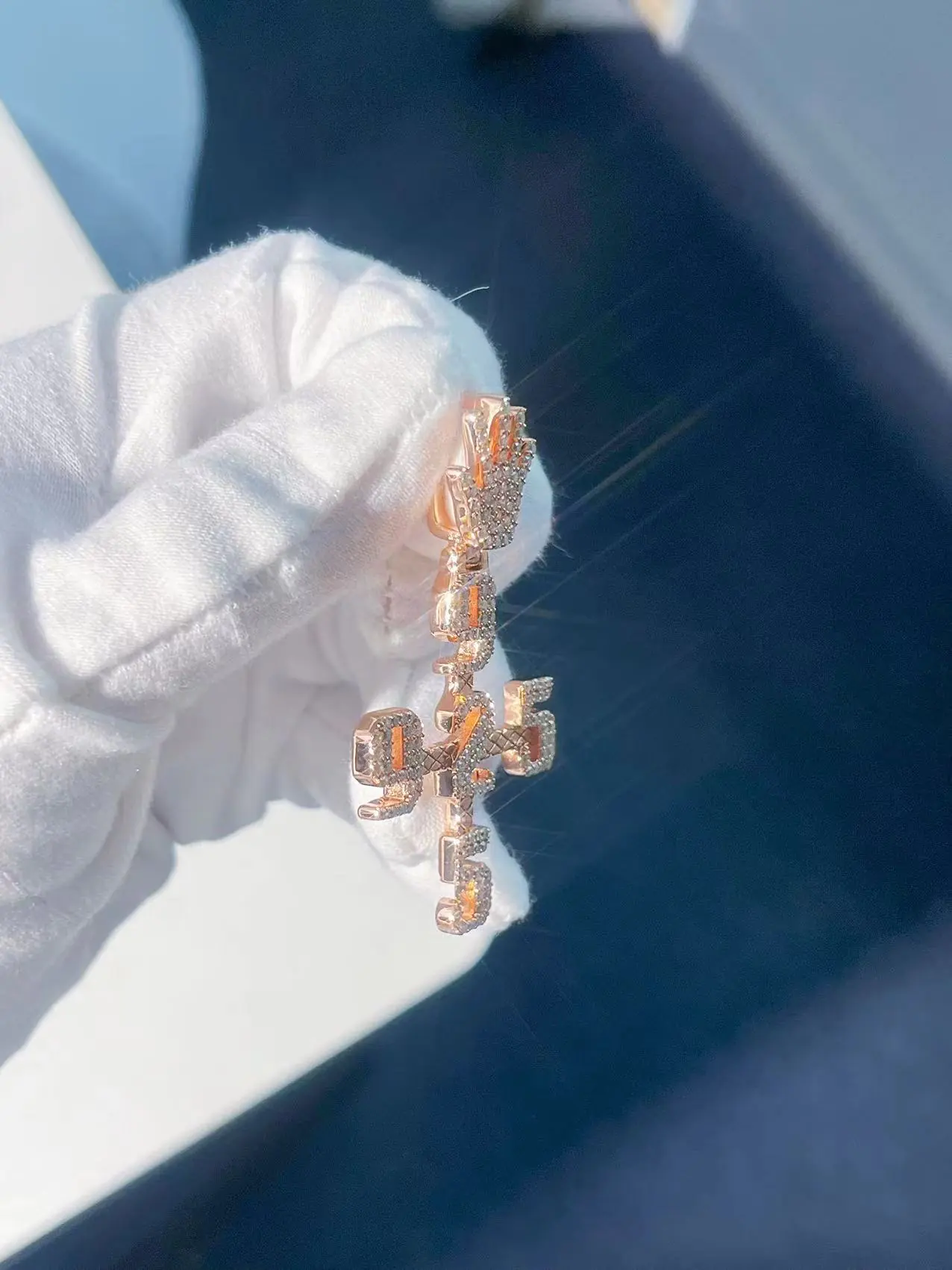 Luxury custom diamond numbers pendant iced out with moissanite stones, side angle