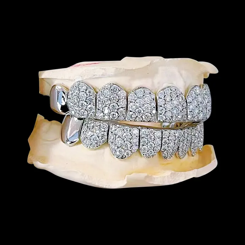 Front view of custom fully iced grillz in 925 silver with VVS moissanite, 14K white gold plating, fully set with round-cut moissanite, on black background.
