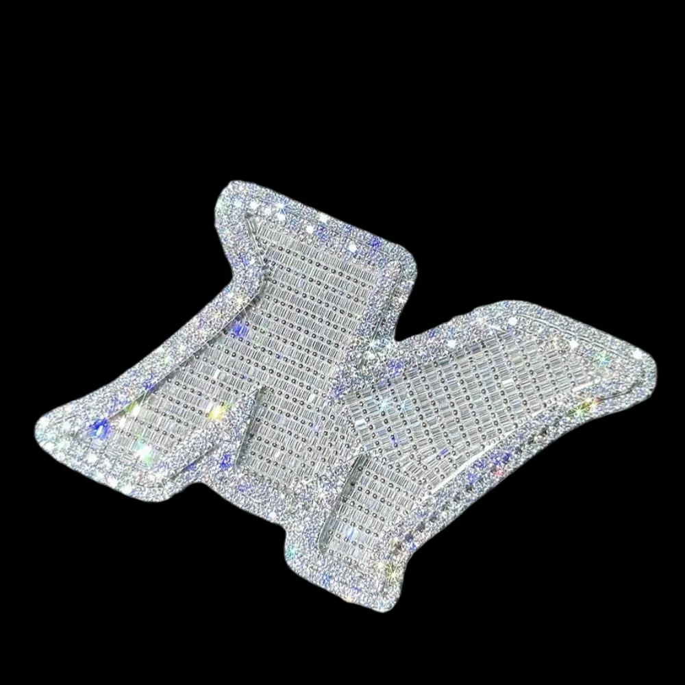 Front view of custom uppercase letter pendant in 925 silver with VVS moissanite, 14K white gold plating, fully set with baguette-cut moissanite, on black background.