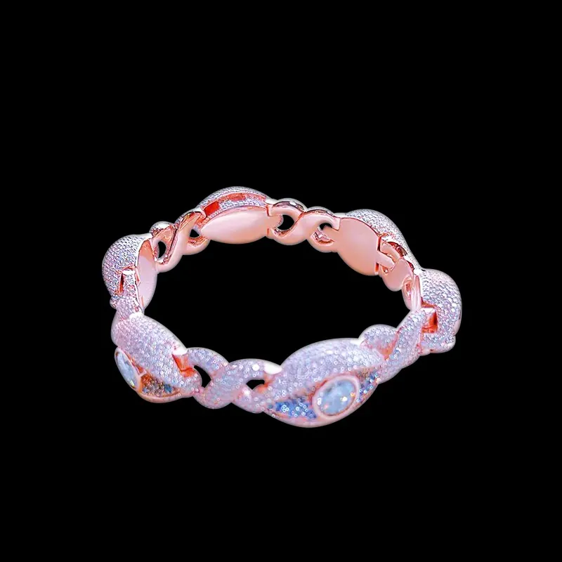 Infinity Eyes Cuban Chain bracelet in sterling silver with VVS moissanite, rose gold plated, 8mm wide with blue and 0.5ct white stones on black background