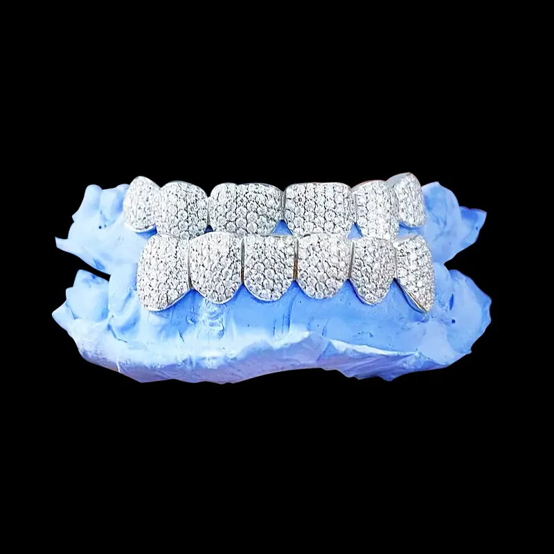 Front view of custom fully iced grillz in 925 silver with VVS moissanite, 14K white gold plating, fully set with round-cut moissanite, on black background.