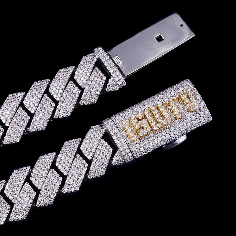 Sterling silver 20mm bold Cuban chain iced out with VVS moissanite, 14K white gold plated, flat display showing custom gold letter box clasp