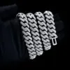 Close up of Custom Clasp 16MM Moissanite Cuban Link Chain in sterling silver with rose gold plating,   FATBOY custom clasp detail wrapped around hand