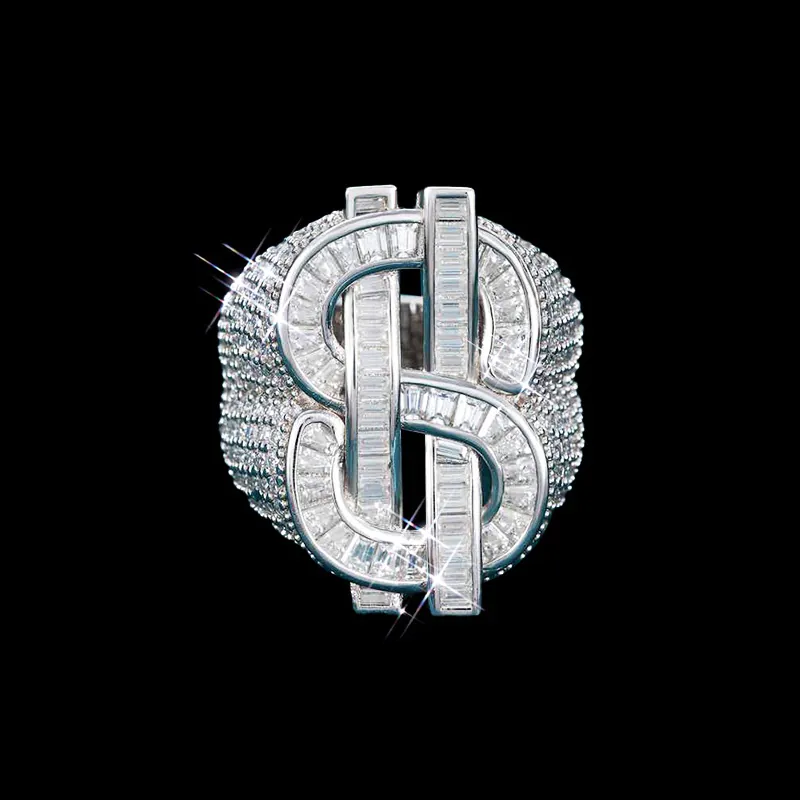 Dollar Sign CZ Ring in brass with baguette and round CZ stones, 14K white gold plated, iced out hip hop jewelry, front view showing $ symbol