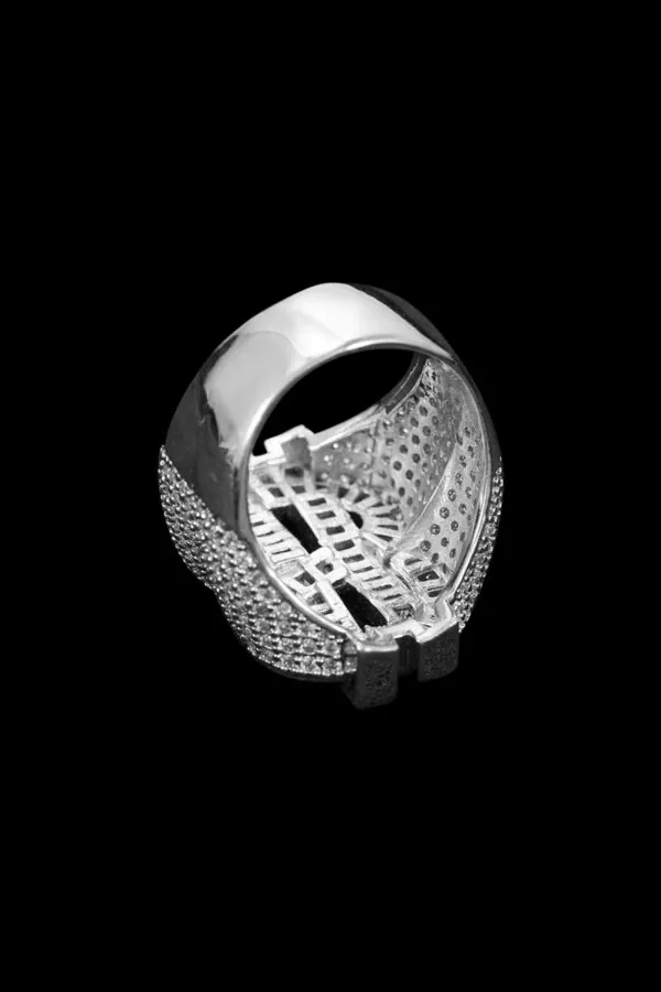 Iced out dollar sign ring with baguette moissanite