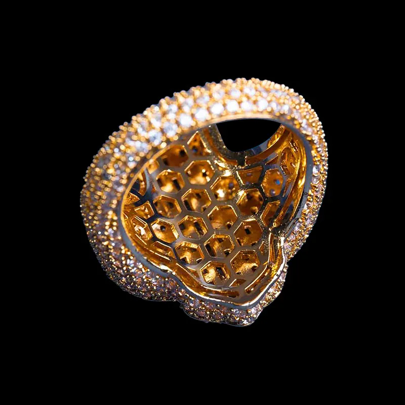 Back view of Fleur Cross Ring in sterling silver with moissanite, 14K gold plated, iced out ring showcasing back details