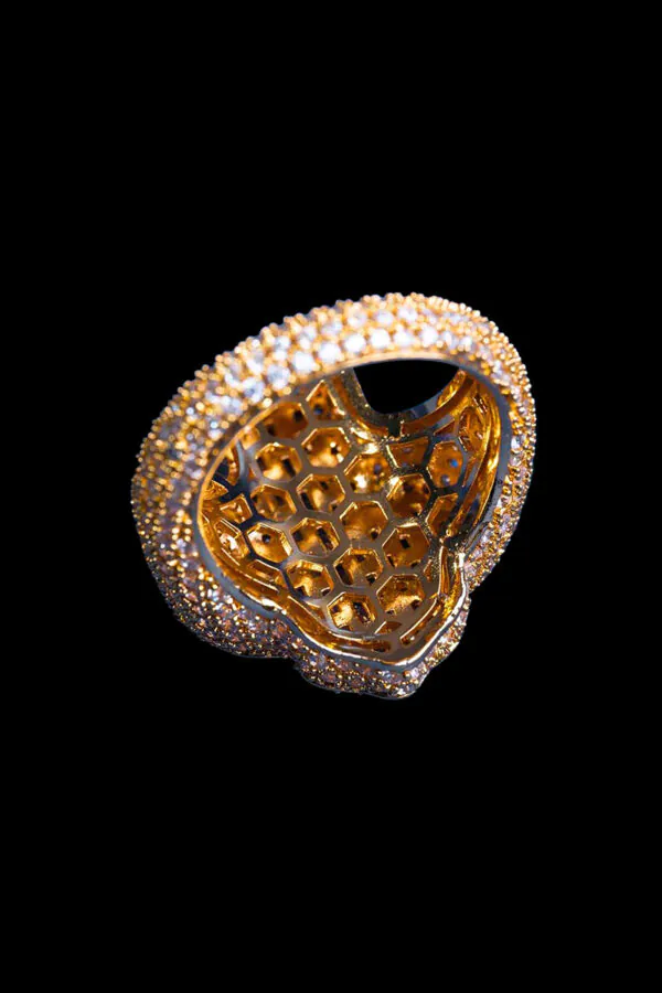 Close-up of moissanite fleur cross design
