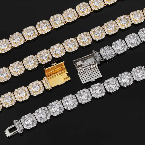 Four cluster tennis chains in gold and silver laid flat on table with open clasps