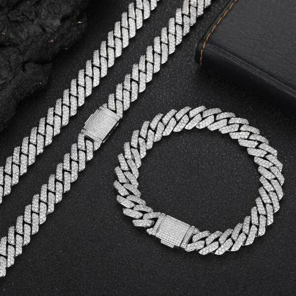 Silver 10mm Miami Cuban chain necklace and bracelet set displayed on table