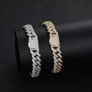 Silver and gold 10mm Miami Cuban chains wrapped around a display cylinder, simulated wear