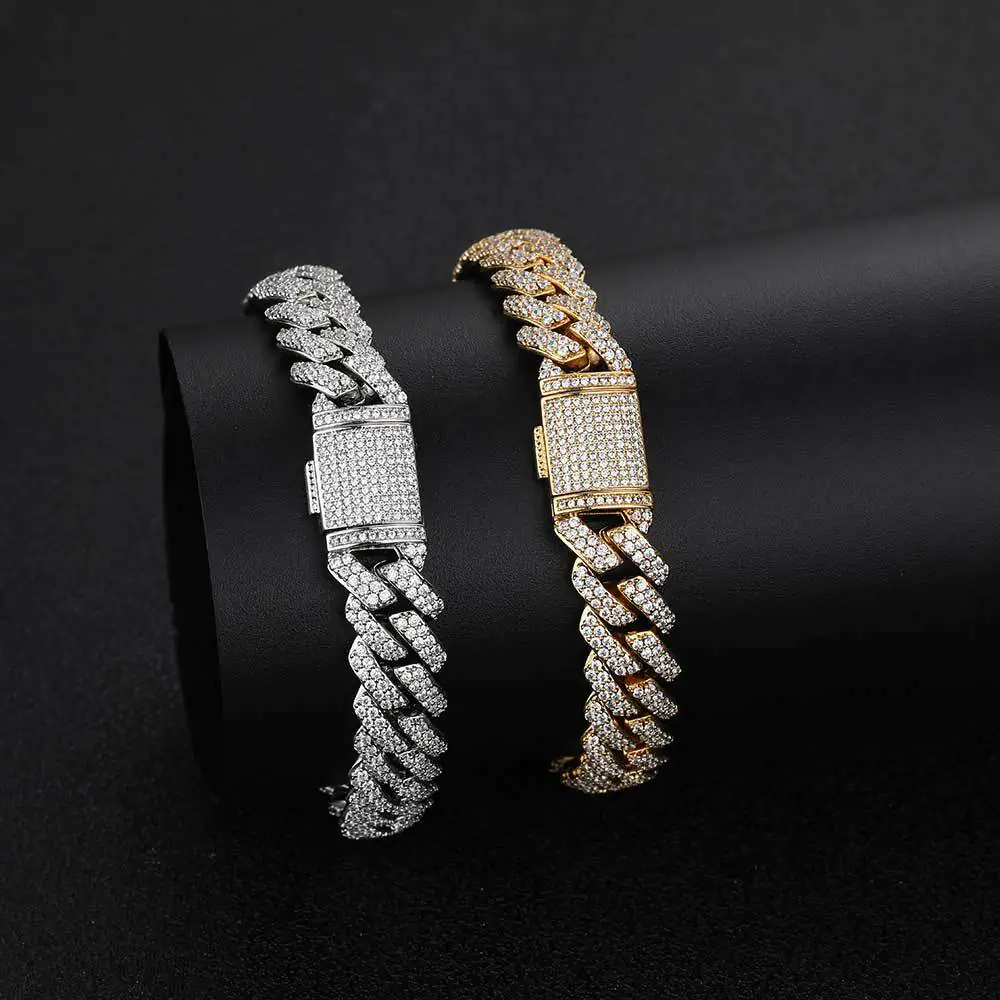 Silver and gold 10mm Miami Cuban chains wrapped around a display cylinder, simulated wear