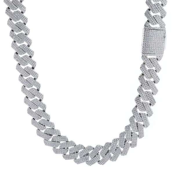 Silver bold Cuban chain hanging against white background