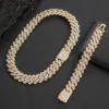 gold bold Cuban chain set with necklace and bracelet, bracelet laid flat, necklace clasp closed