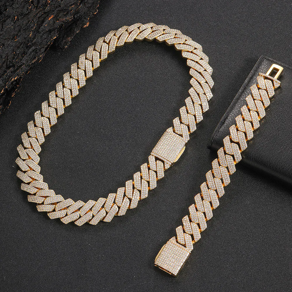 gold bold Cuban chain set with necklace and bracelet, bracelet laid flat, necklace clasp closed
