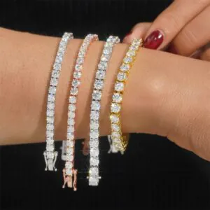 Woman wearing 5mm VVS moissanite tennis bracelet in 14K gold plating, available in white gold, yellow gold, and rose gold colors