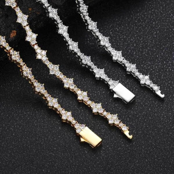 Two Special Links Tennis Chains laid flat on black background, gold facing up, silver showing back side for detail view