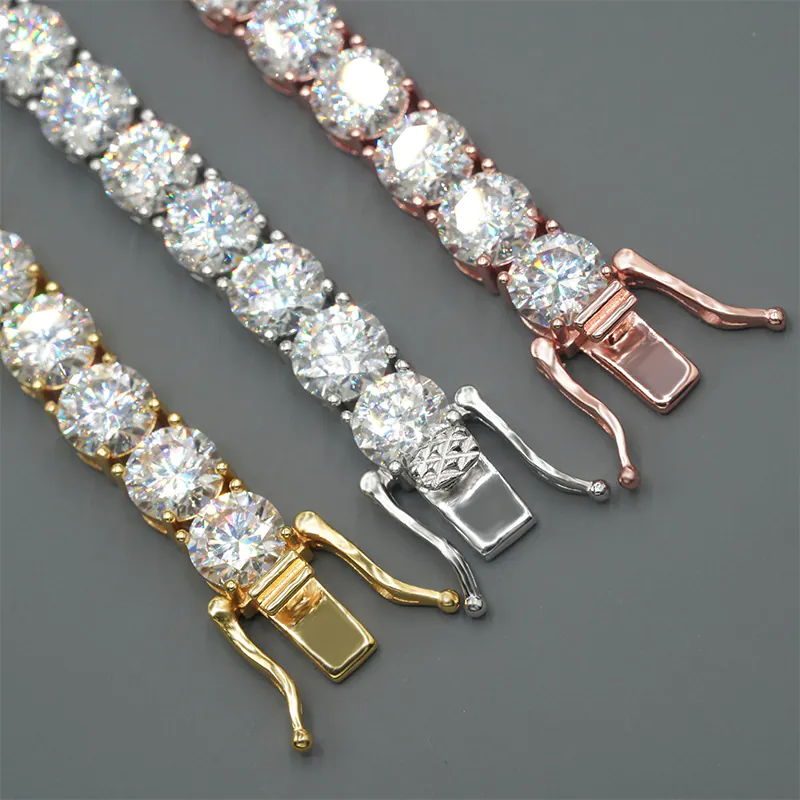 Detailed view of clasp ends on three 6.5mm 925 silver moissanite tennis chains in various gold colors