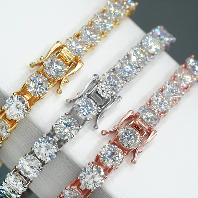 Close-up of 6.5mm moissanite tennis chains in white gold, yellow gold, and rose gold showing clasp and fire of stones