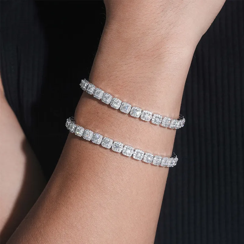 Two 6mm halo moissanite bracelets worn on wrist, brilliant shine under light