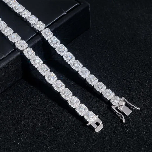 Close-up of two white gold halo bracelets with visible end clasps and VVS stones