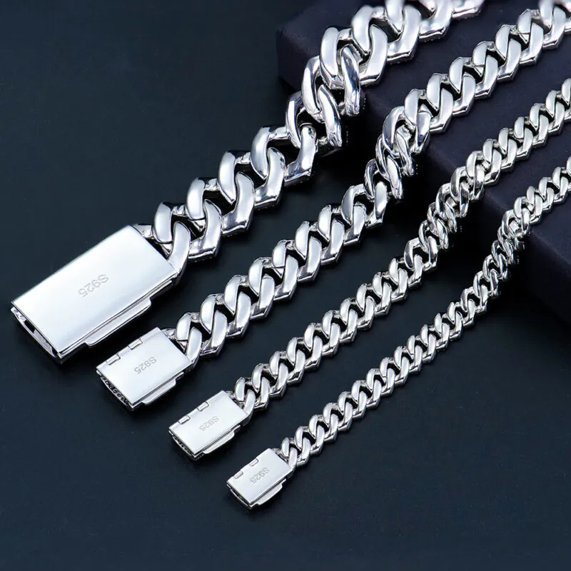 Backside view of four 925 silver Cuban chains in different widths showing stamped hallmark