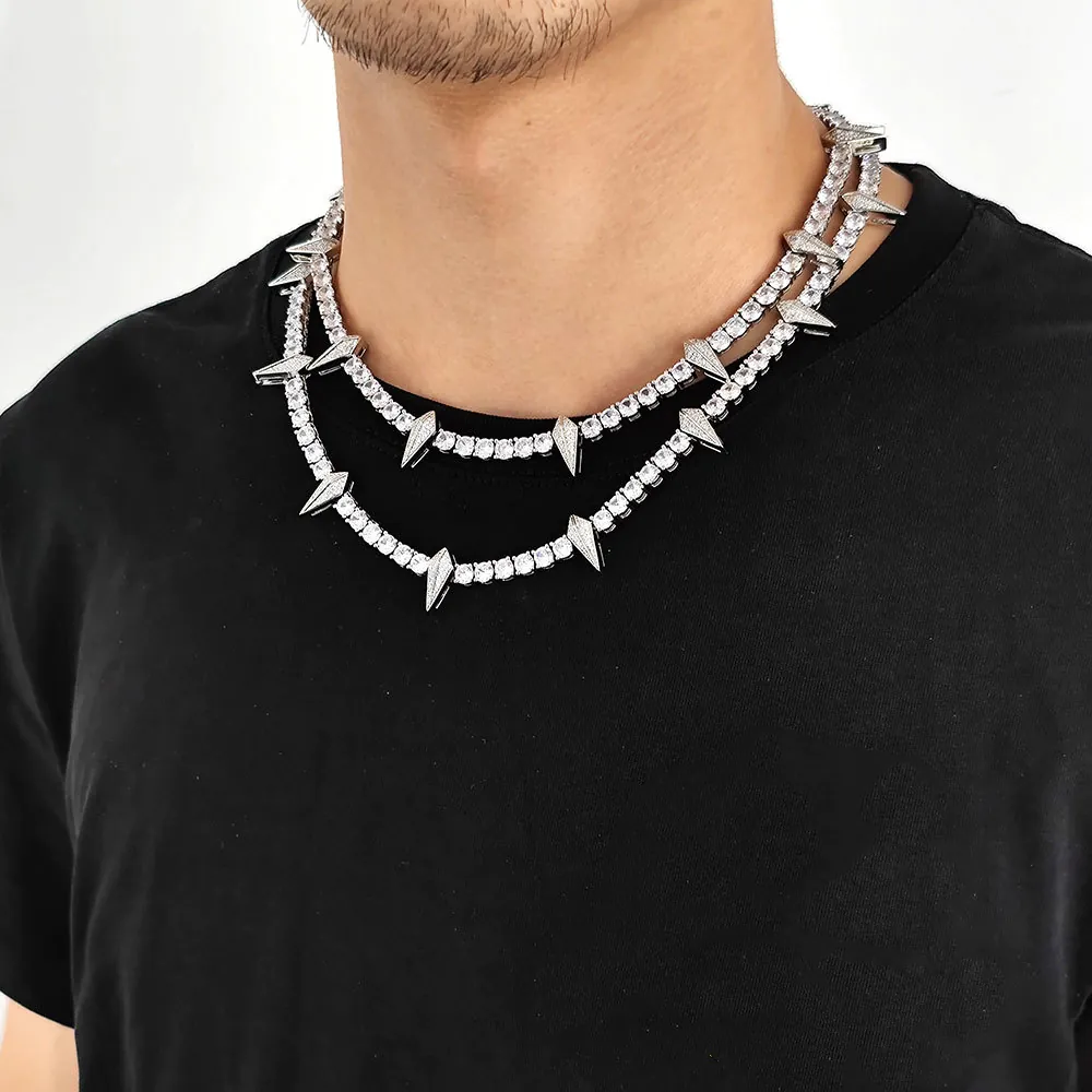 Man wearing two silver panther tennis chains layered for bold hip hop look