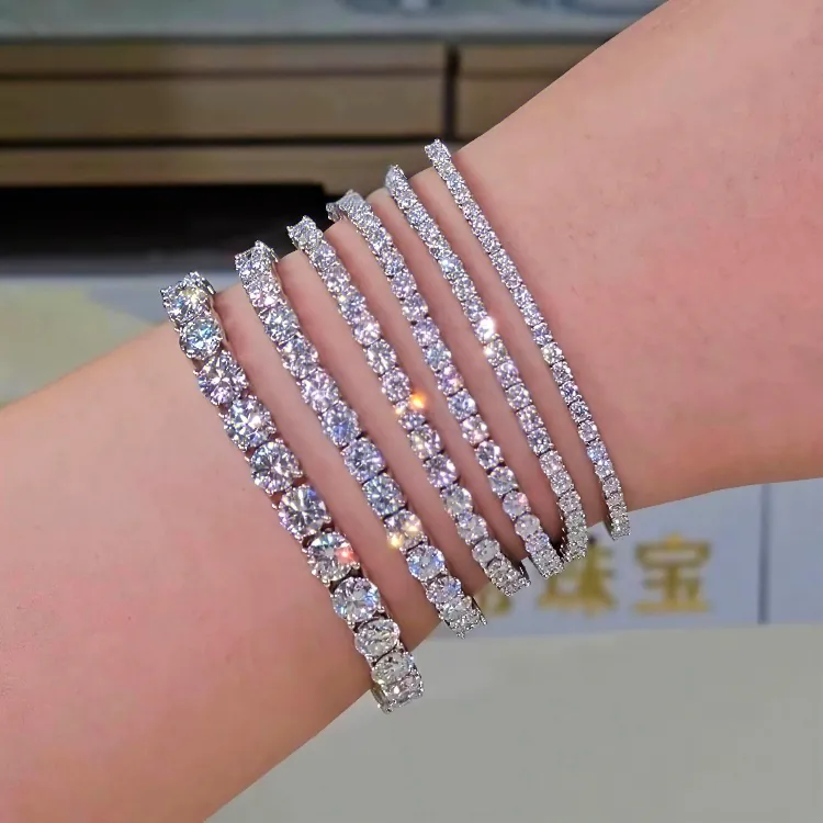 Stacked Tennis Bracelets on wrist in sterling silver with VVS moissanite, 14K white gold plated, iced out hip hop jewelry in widths 2mm 3mm 4mm 5mm 6mm 6.5mm