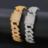 One gold and one silver 14mm brass Cuban bracelet wrapped around a cylinder for wear simulation