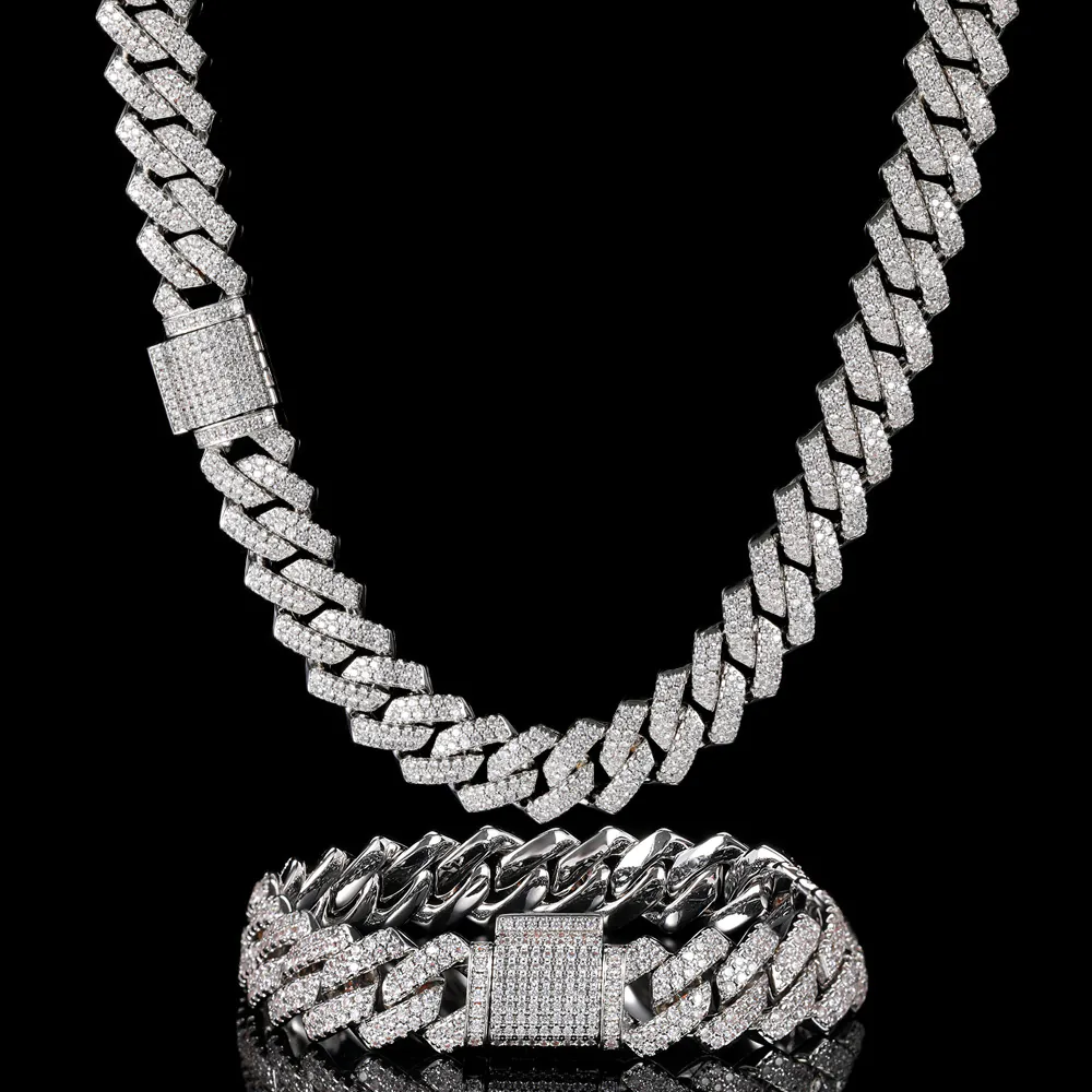 One silver 14mm Cuban chain hanging on top, with matching bracelet below on black background