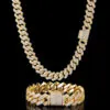 One gold 14mm Cuban chain hanging on top,   with matching bracelet below on black background